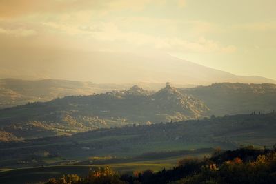 Scenic view of landscape against sky during sunset