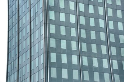 Low angle view of modern building against sky in city