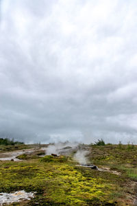 Scenic view of field against sky