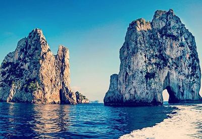 Scenic view of rocky mountains against clear sky
