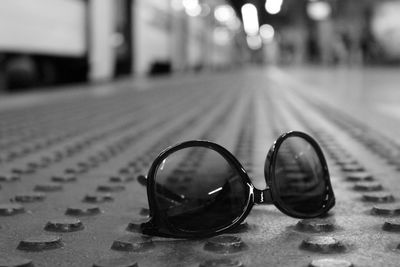 Sunglasses on station platform