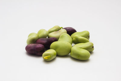 Close-up of fruits against white background