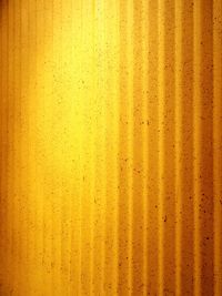 Full frame shot of yellow corrugated iron