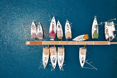 Aerial view of boats in harbor in lefkada city