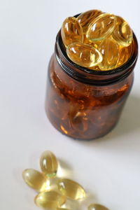 High angle view of glass jar on white background