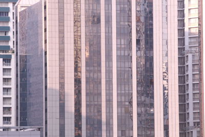 Low angle view of modern buildings in city