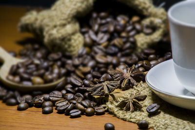 Close-up of coffee beans on table