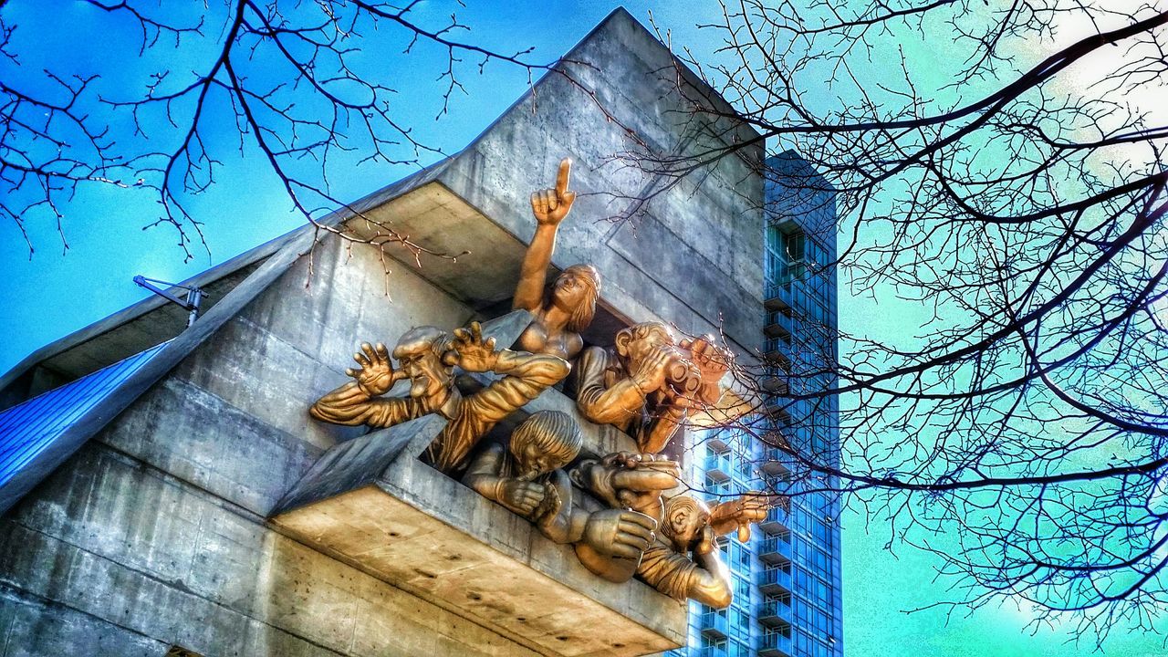 architecture, built structure, building exterior, low angle view, damaged, blue, window, old, weathered, abandoned, deterioration, house, bare tree, run-down, wall - building feature, obsolete, branch, building, day, bad condition