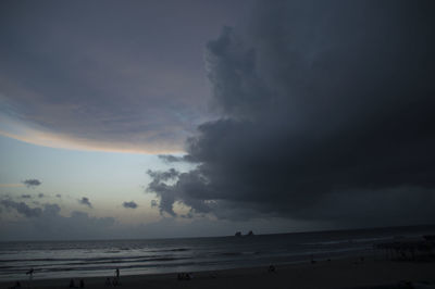 Scenic view of sea against dramatic sky