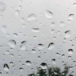 Close-up of water drops on glass