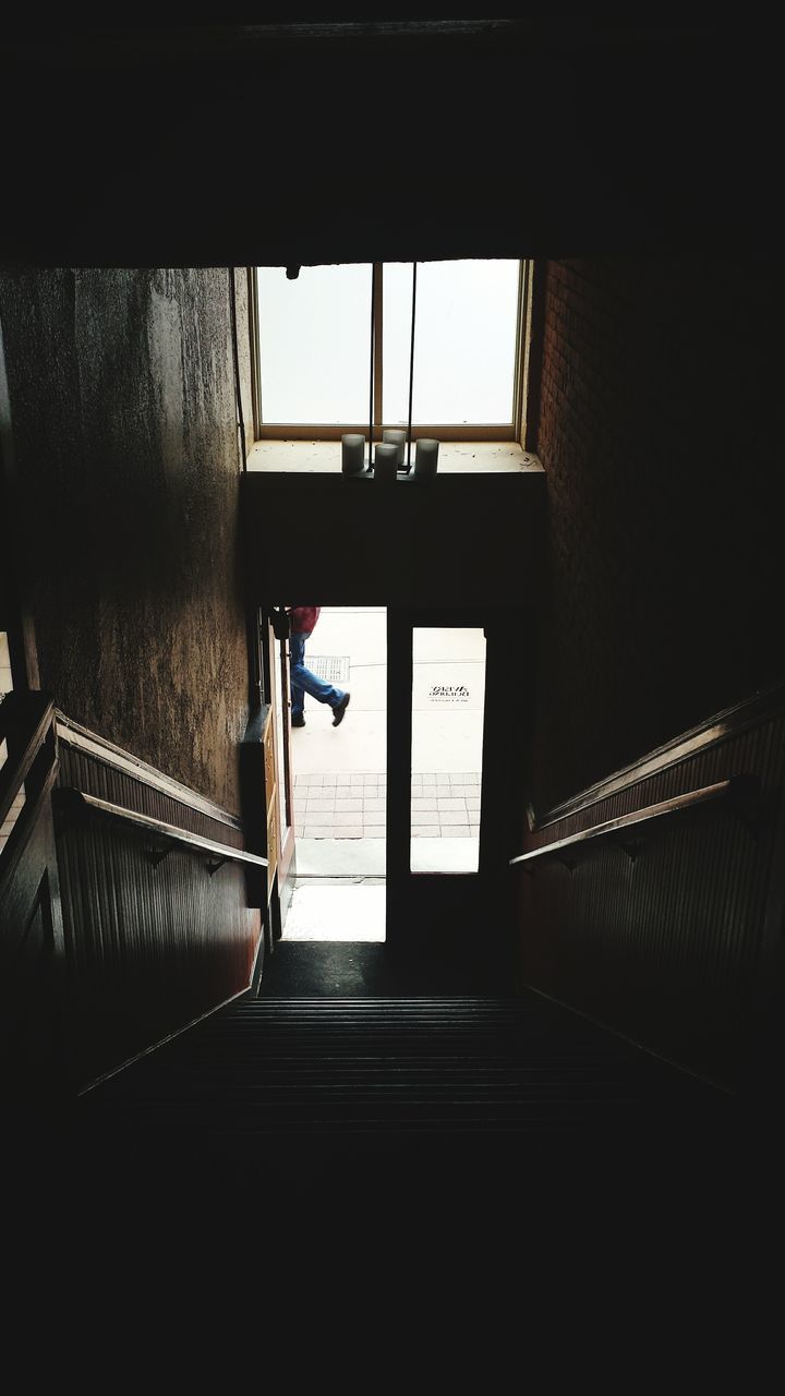 indoors, architecture, built structure, window, railing, steps, house, building, low angle view, staircase, sunlight, building exterior, wall - building feature, steps and staircases, shadow, day, wall, no people, glass - material, residential structure