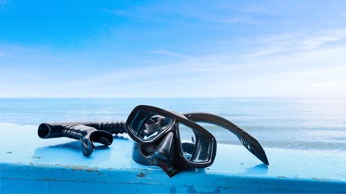 Snorkel mask with the sea background