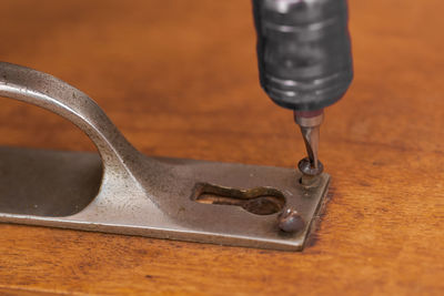 Close-up of machine on table