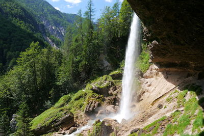 Scenic view waterfall at kranjska gora