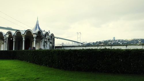 View of bridge against cloudy sky