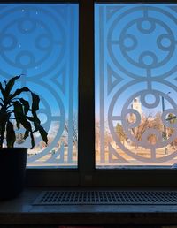 Close-up of window against blue sky