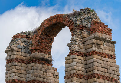 Low angle view of old temple against sky