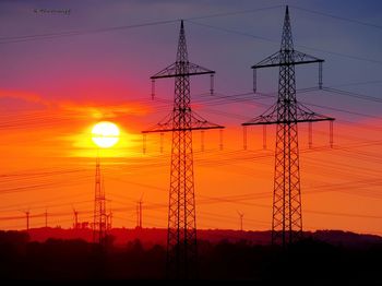 Electricity pylon at sunset