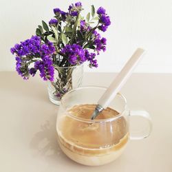 High angle view of purple flower vase on table