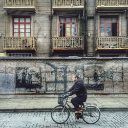 Full length of woman standing in city