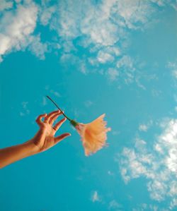 Flower falling from the hand