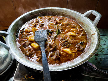 High angle view of soup in bowl on the stove