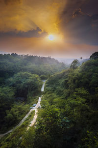 Scenic view of mountains against sky during sunset
