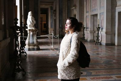 Woman looking at statue