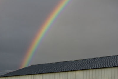 Low angle view of rainbow against sky