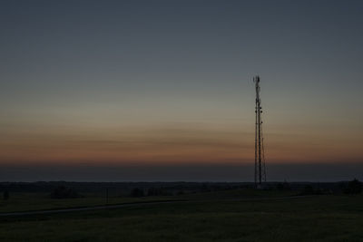 Silhouette landscape against sky during sunset