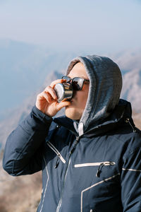 Man photographing with camera