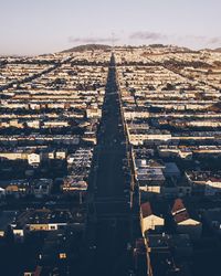 Aerial view of cityscape during sunset