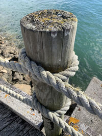 High angle view of wooden post in sea