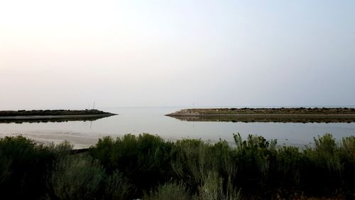 Scenic view of sea against clear sky