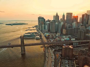 High angle view of city buildings during sunset