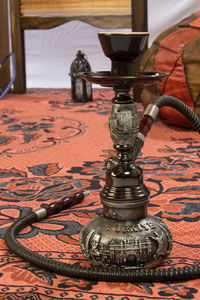 Hookah on carpet at home