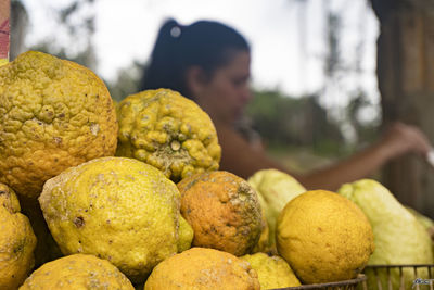 Close-up of yellow fruits in market