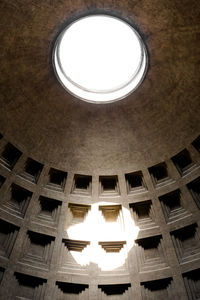 Low angle view of illuminated ceiling