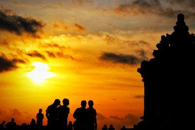 Silhouette of people during sunset