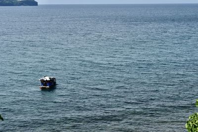 Boat sailing in sea