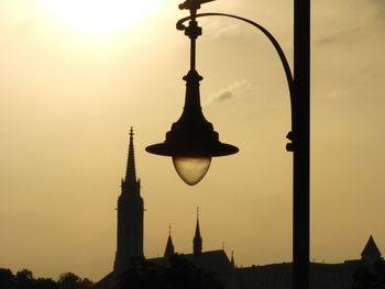 Silhouette of cathedral against sky during sunset
