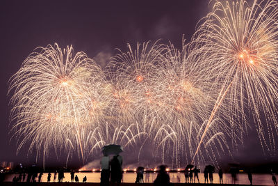 Firework display at night