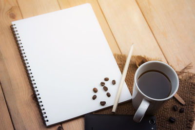 High angle view of coffee on table