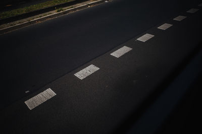 High angle view of information sign on road in city