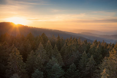 Scenic view of mountains against sky during sunset