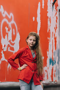 Teenager girl in red jacket