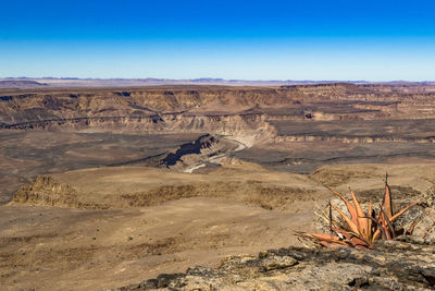 Scenic view of dramatic landscape against clear sky