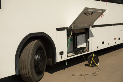 Broken bus. public transport battery charging. a bus with an unfolded wheel.