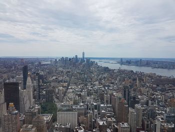 Aerial view of cityscape against sky