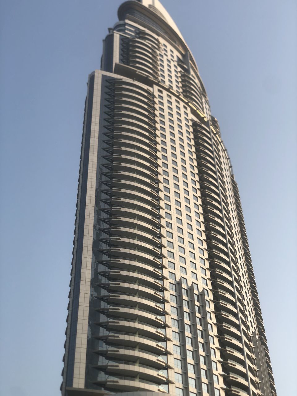 LOW ANGLE VIEW OF BUILDING AGAINST CLEAR SKY
